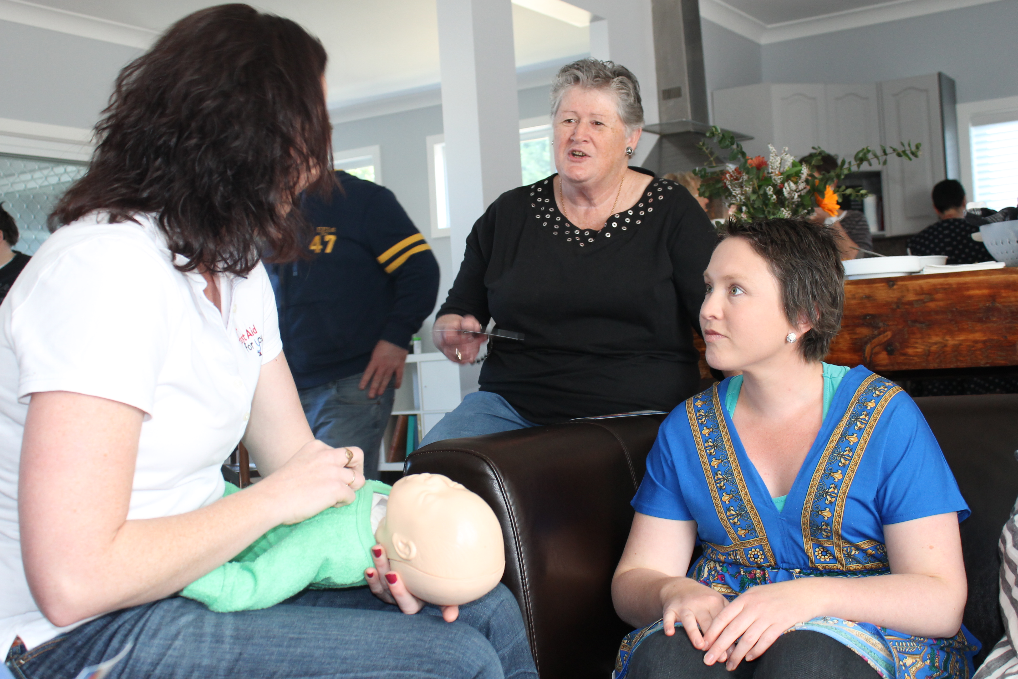 First Aid For You teaching baby CPR at a baby shower
